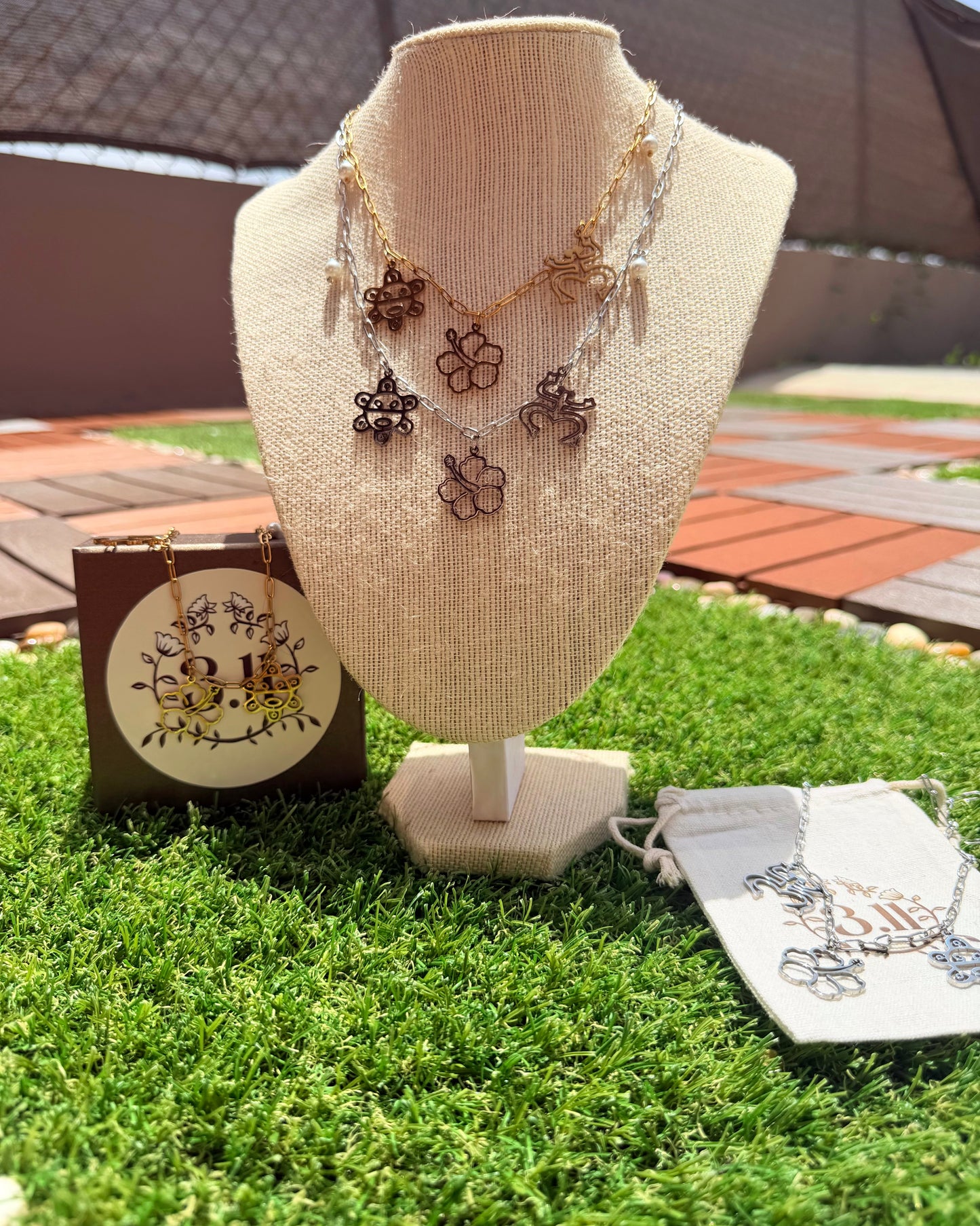 Alma taina -Sol Taino, coqui taino y flor de Maga.
