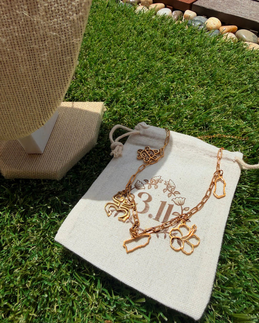Legado - garita, flor de maga, isla, coqui y sol taino.